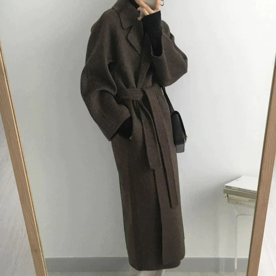 Warm, padded winter jacket for women with full length